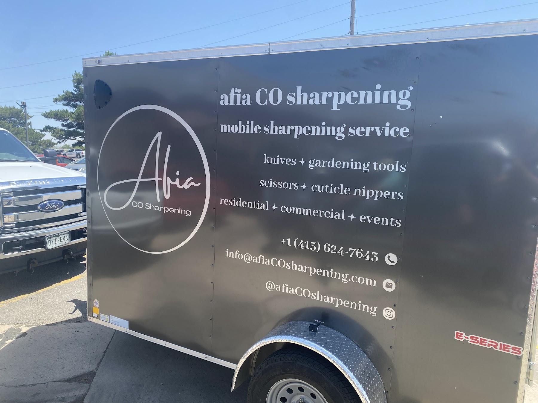 Afia CO Sharpening's branded mobile trailer