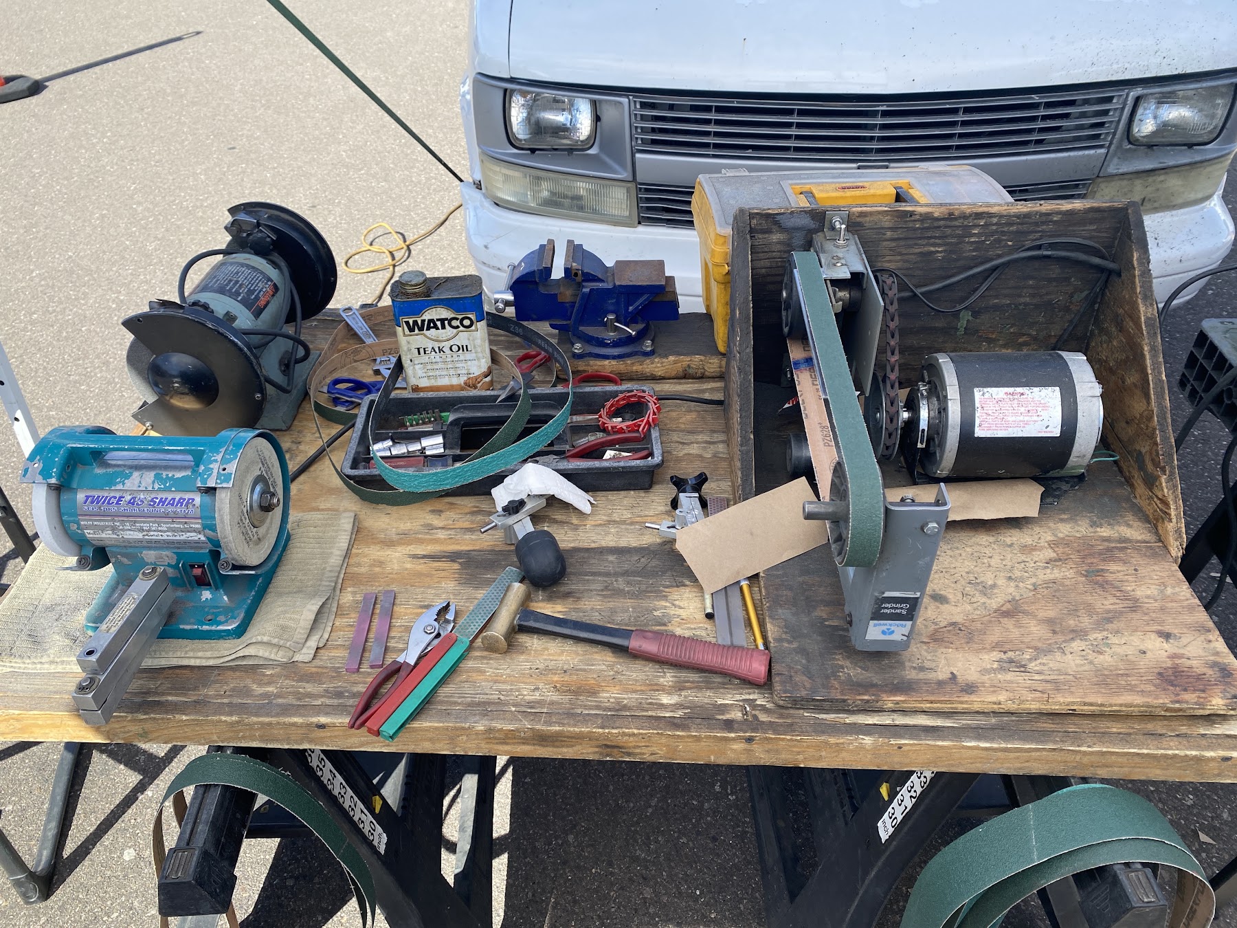 Afia's sharpening wheels, guides and hand tools set up for blade work